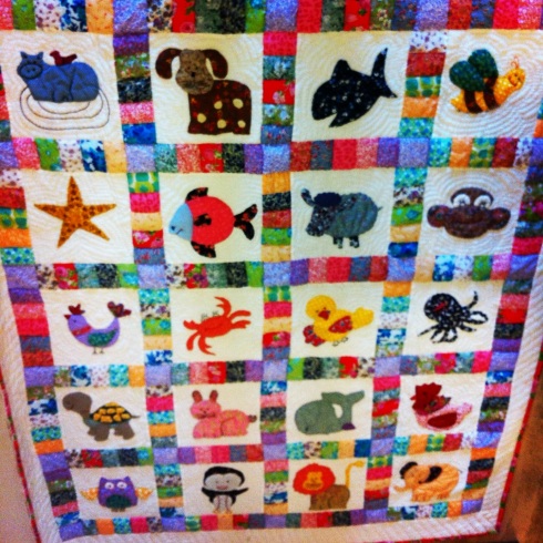 A kiddie quilt. I love these animal motifs :) 