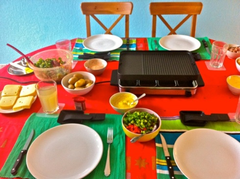 Raclette machine and the spread